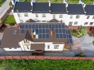 aerial view of house with solar panels installed 